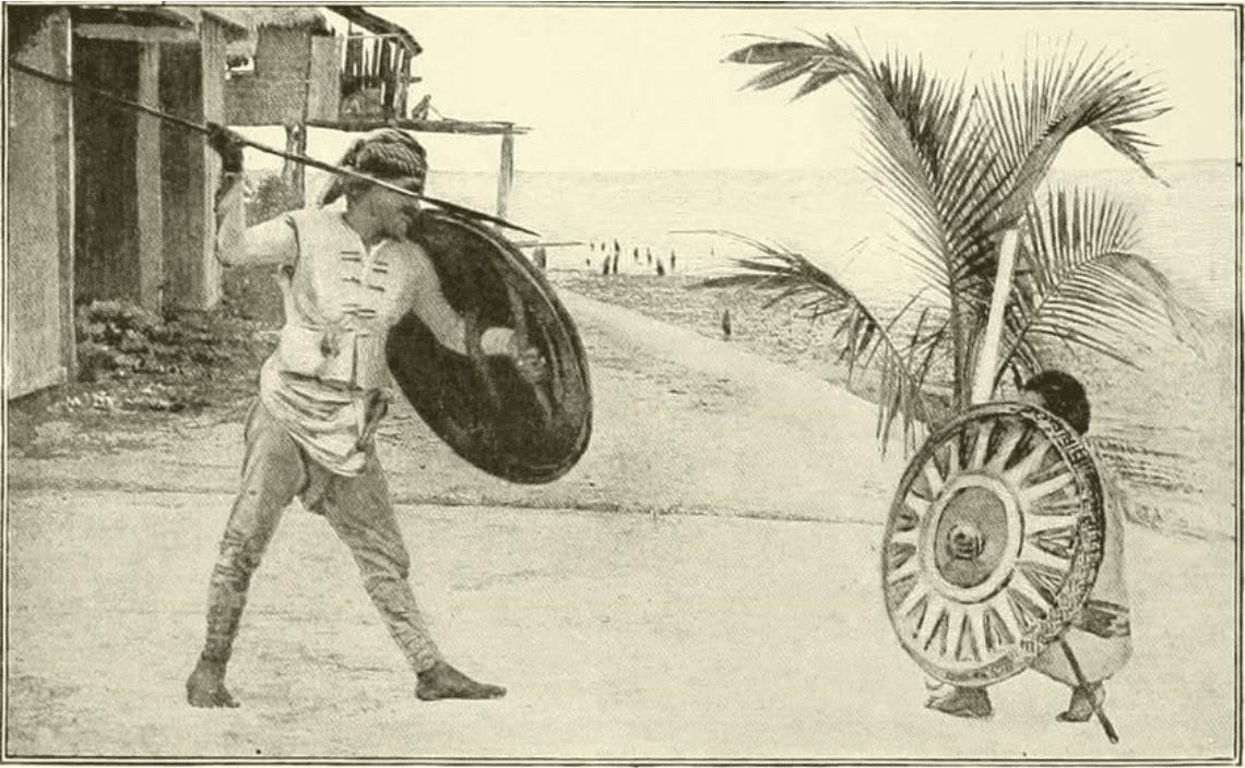 Tausug warriors in full regalia around 1899
